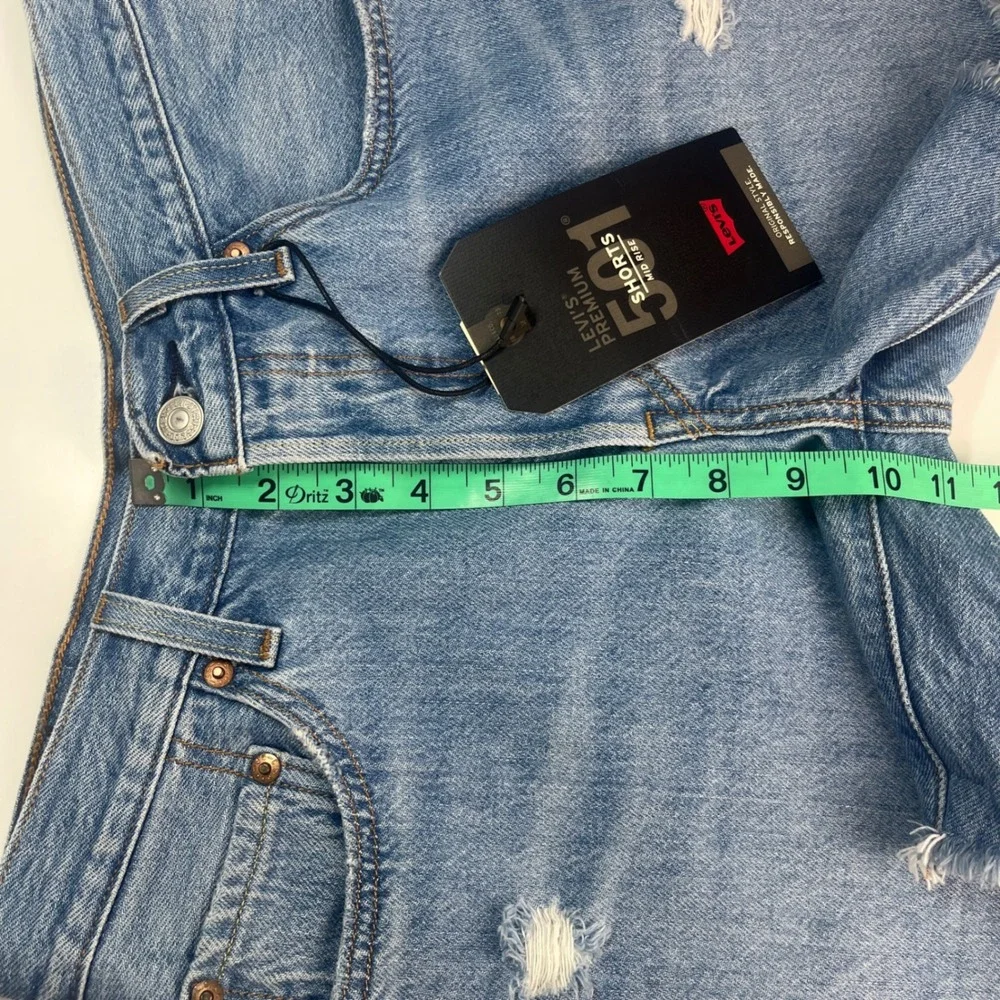 Levi's Premium‎ 501 Long Shorts Women's 26 NWT Blue Distressed Raw Hem Mid Rise